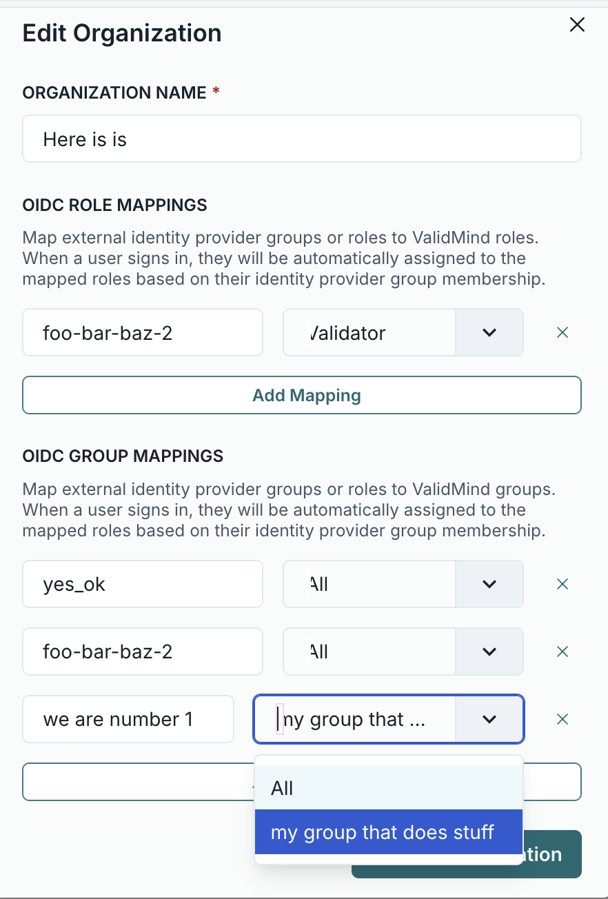 A form interface titled Edit Organization with a text field labeled Organization Name marked with a red asterisk, indicating it is required. Below, there are sections for OIDC Role Mappings and OIDC Group Mappings. The OIDC Role Mappings section includes a mapping labeled foo-bar-baz-2 with a text field set to /alidator and an Add Mapping button. The OIDC Group Mappings section contains three mappings: the first with a text field labeled yes_ok set to All, the second with foo-bar-baz-2 set to All, and the third with a text field labeled we are number 1 and a dropdown menu displaying Any group that with a selected option my group that does stuff. A blue Save Organization button is located at the bottom right corner.